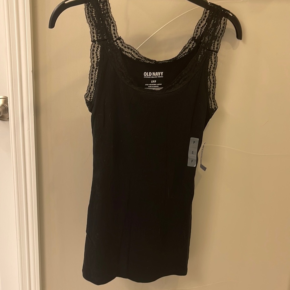 Black tank top with lace detail. Small NWT